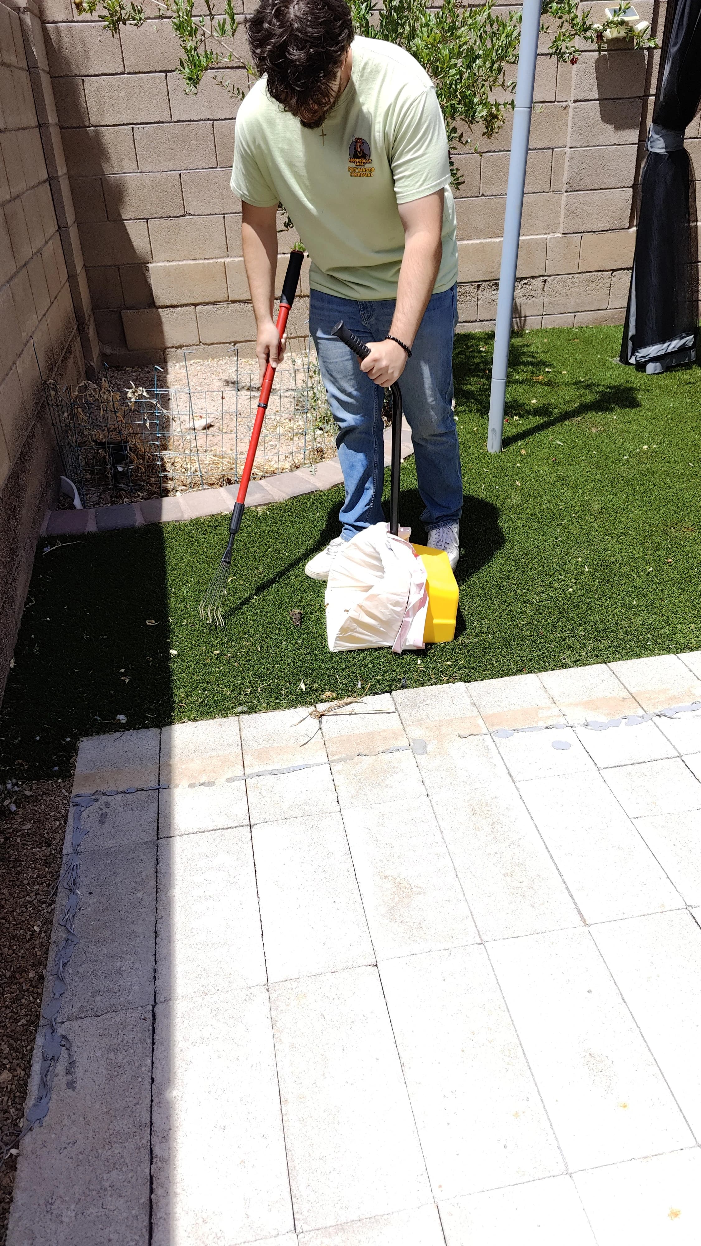 Scoop Doggy Logs team member working a cleanup route