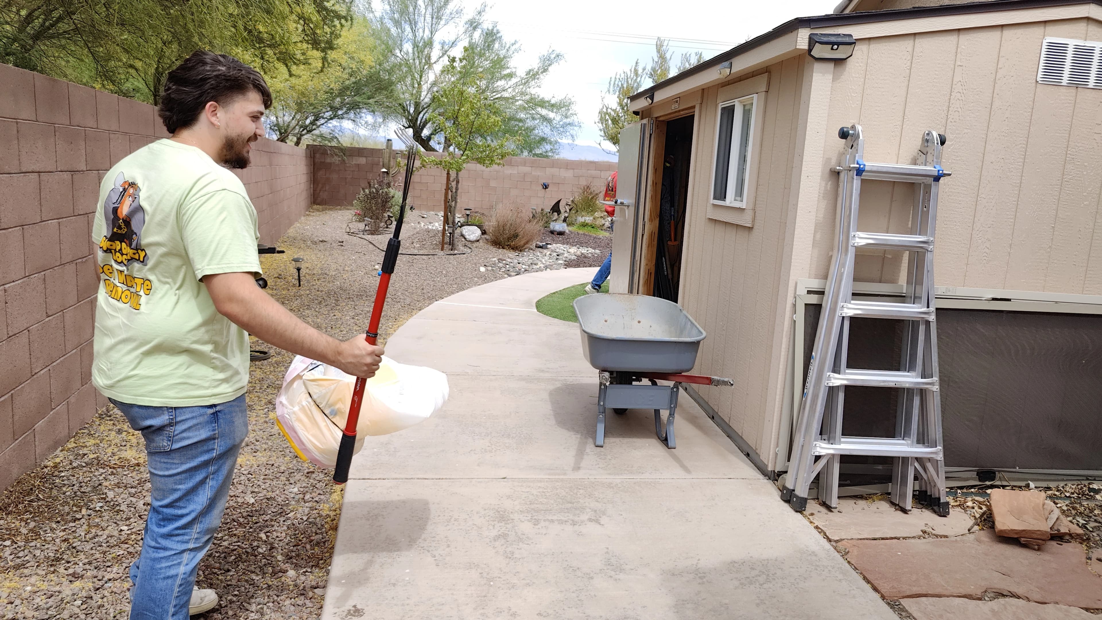 Scoop Doggy Logs route service in progress at a Tucson home