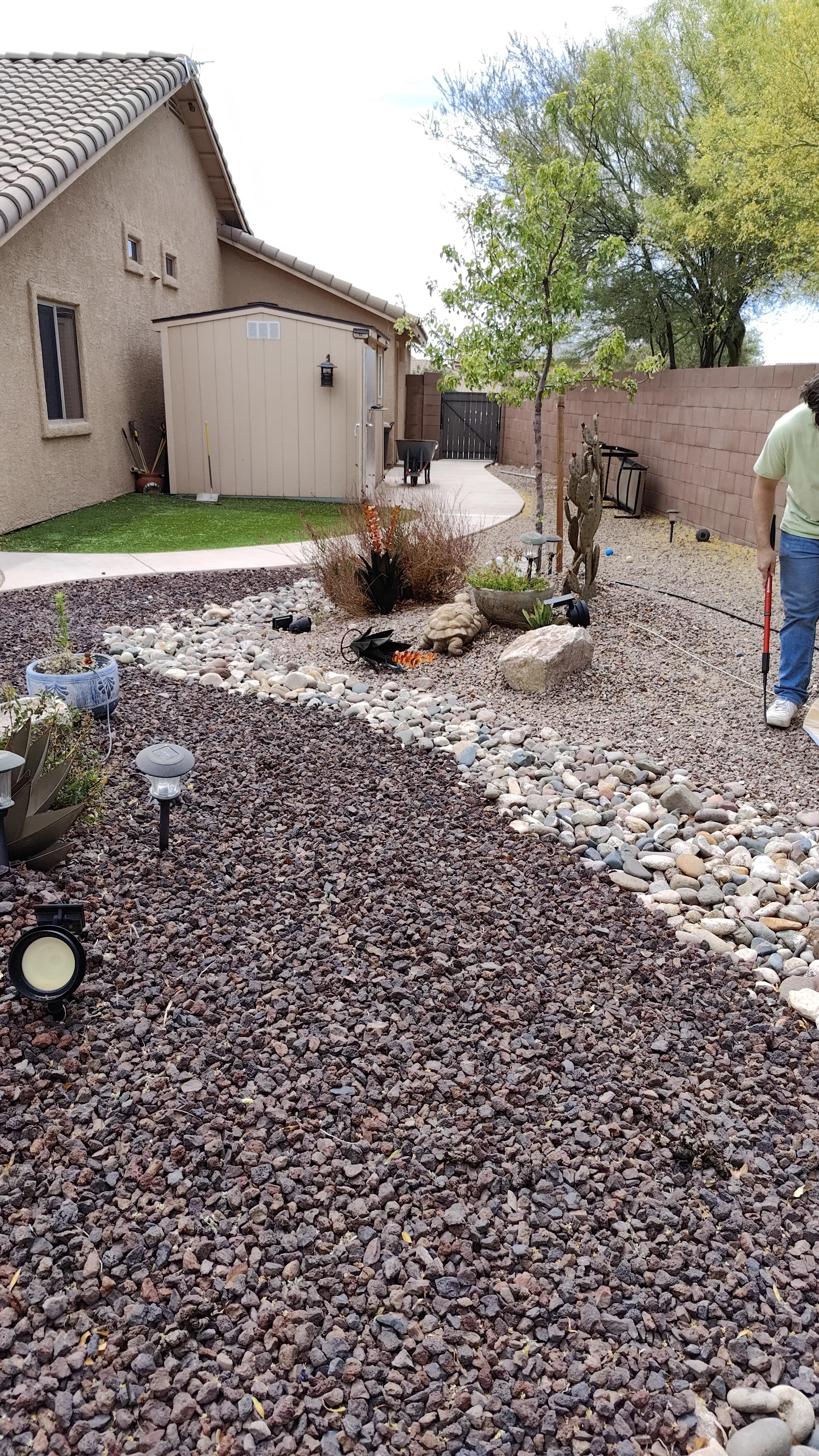 Cleanup crew member moving through a backyard route
