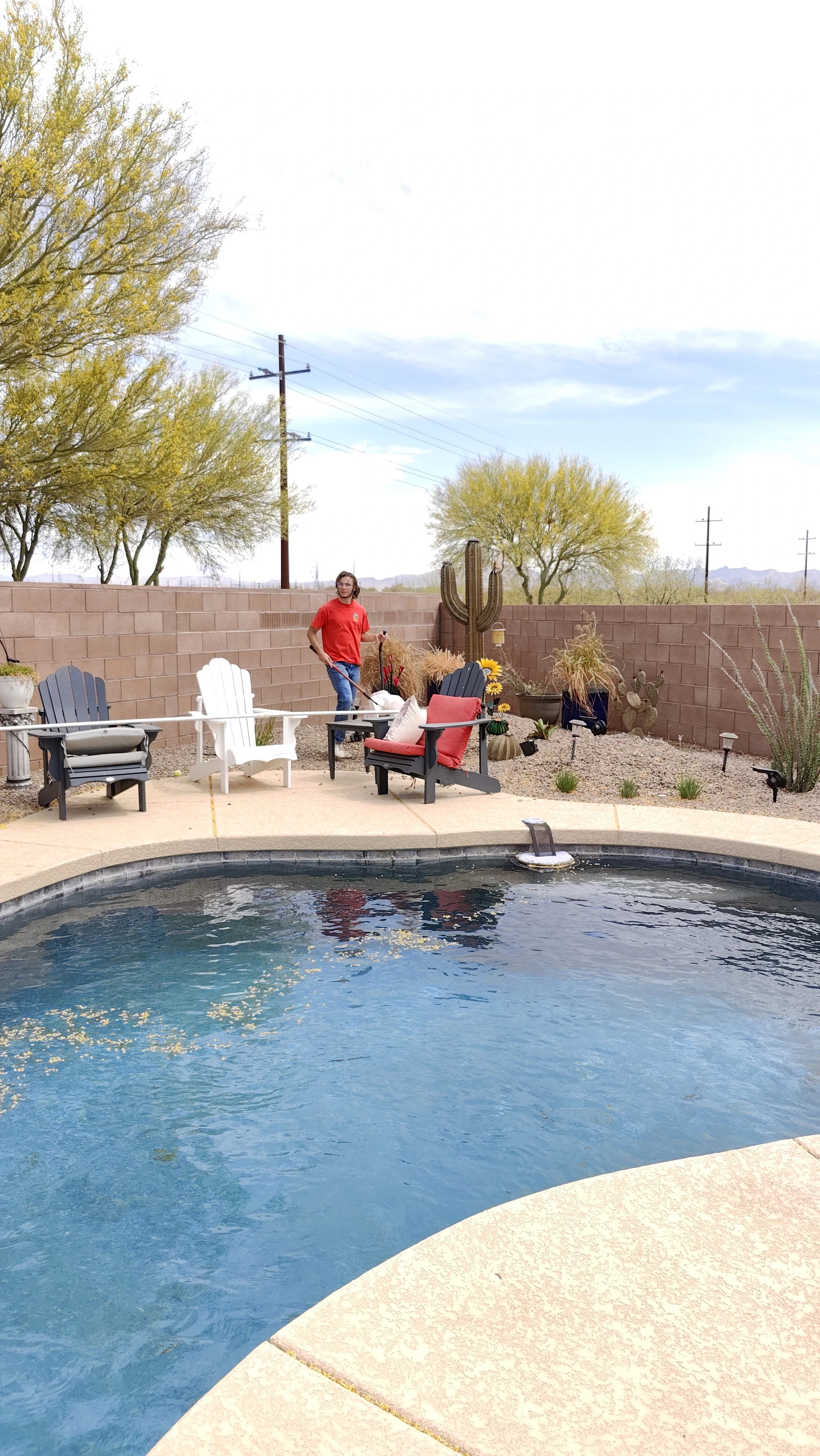 Team member using cleanup tools on a route