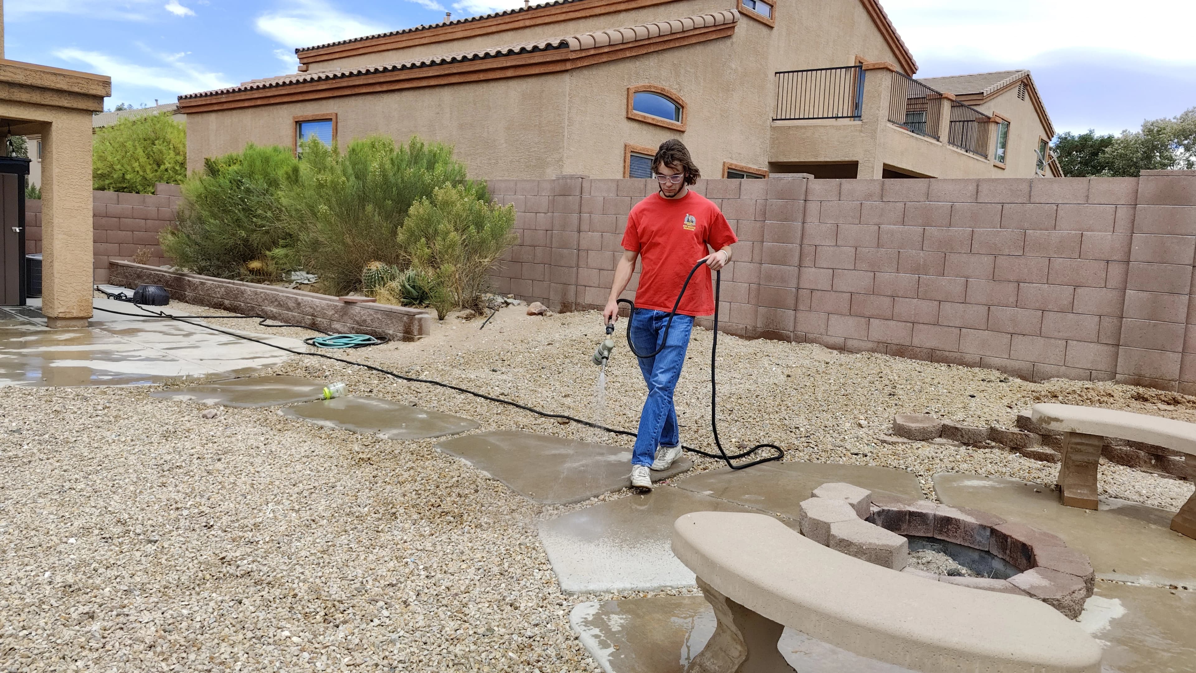 Yard deodorizer and sanitizer treatment being applied in Tucson