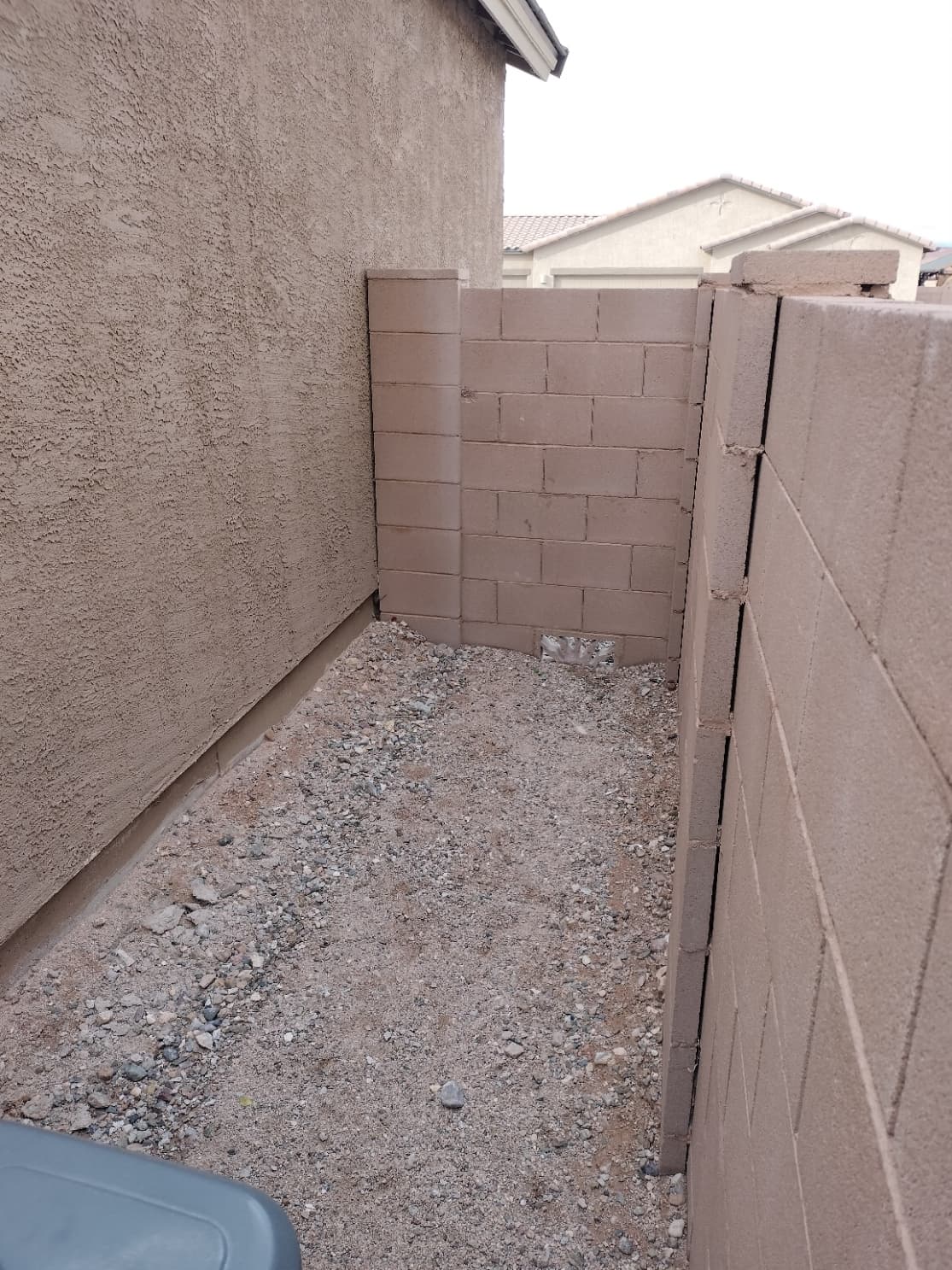 Yard with gravel, turf, and low desert landscaping