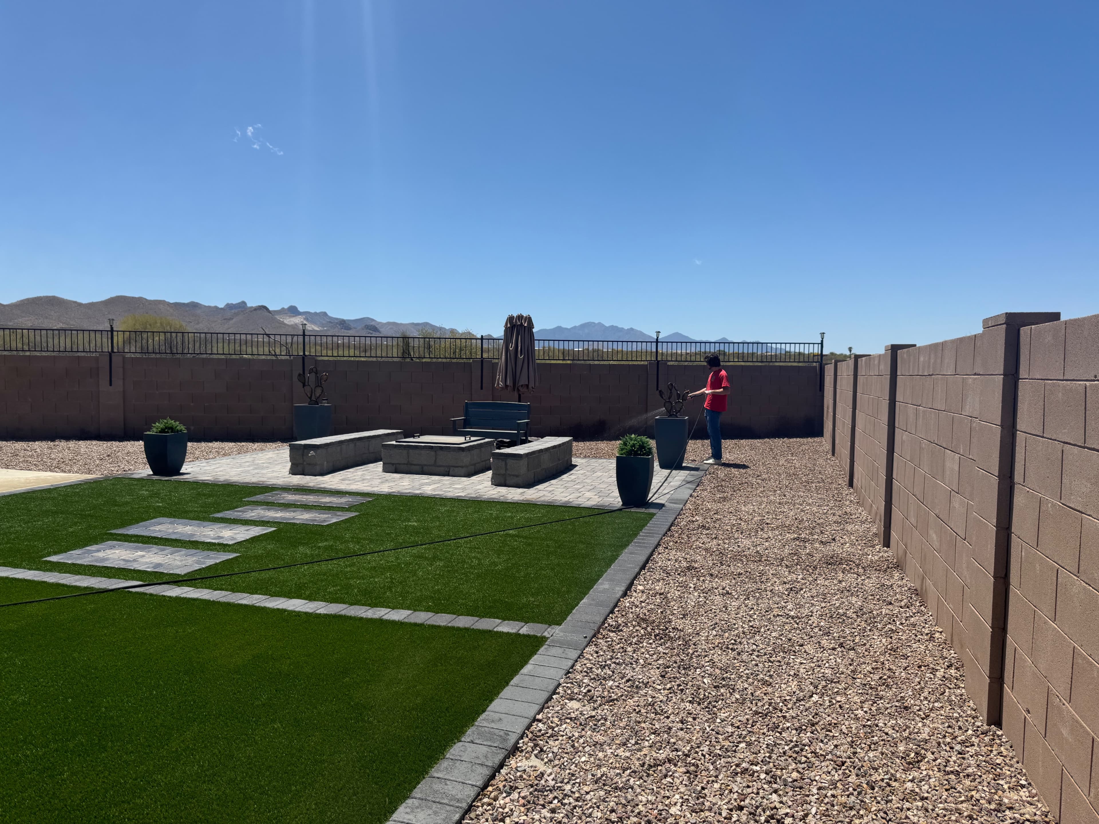 Backyard with turf and desert landscape