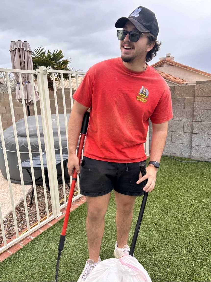 Scoop Doggy Logs team member in the field